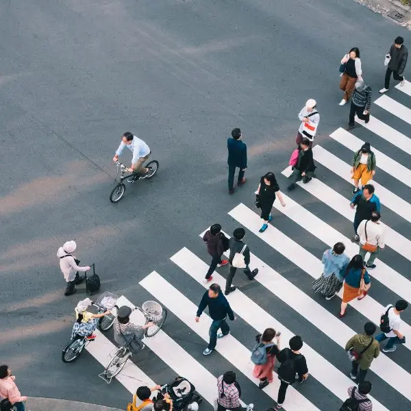 People crossing a street in the city